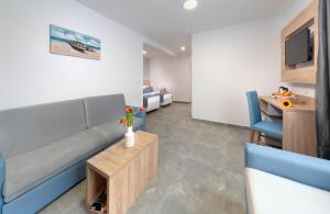 TV a/nebo společenská místnost v ubytování Martinez Hotel All Inclusive