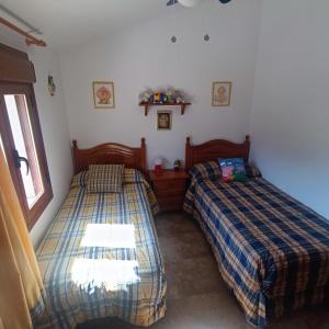 Postel nebo postele na pokoji v ubytování Casa Antonia 55