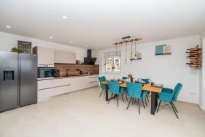 Kuchyň nebo kuchyňský kout v ubytování Villa Laganini Apartment 2&4