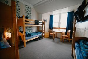 Postel nebo postele na pokoji v ubytování Pitlochry Youth Hostel