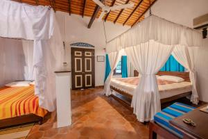 Llit o llits en una habitació de Ging Oya Lodge