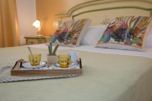 Postel nebo postele na pokoji v ubytování Blue Sea B&b