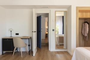 Postel nebo postele na pokoji v ubytování Hotel Rovira