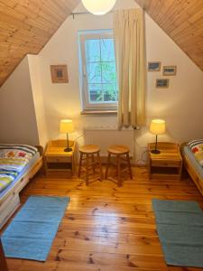 Postel nebo postele na pokoji v ubytování Willa Leśna Dębki