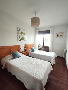A bed or beds in a room at DÚPLEX SANABRIA