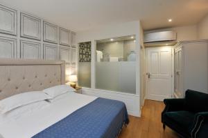 Postel nebo postele na pokoji v ubytování The Duke luxury rooms