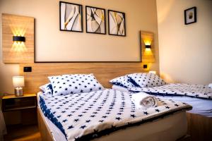 Posteľ alebo postele v izbe v ubytovaní Hotel Bolero