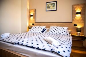 Posteľ alebo postele v izbe v ubytovaní Hotel Bolero