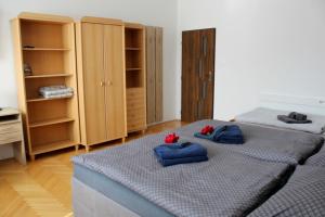 Postel nebo postele na pokoji v ubytování Apartmanový dom Stummerova