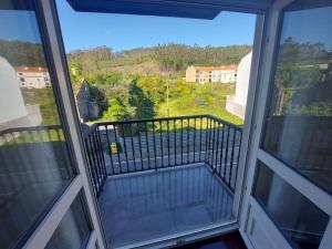 a view from a window of a balcony at INcostadamorte Vivienda Martinez in Cee