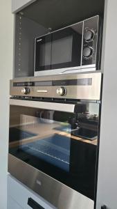 Kuchnia lub aneks kuchenny w obiekcie Apartament Pod Dwójką