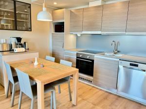 Kuchyň nebo kuchyňský kout v ubytování Chalet 4 A