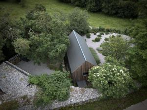 an overhead view of a building in a garden at Moon - Tiny house from Callin Wines in Sežana