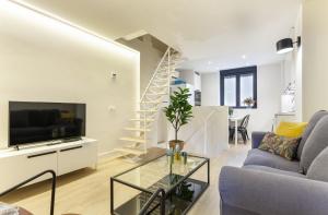 A television and/or entertainment centre at Apartamento Retiro V en Madrid