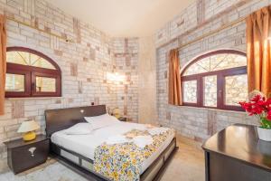 Postel nebo postele na pokoji v ubytování Paco's Resort Family Villa 10 + 13 fotografií