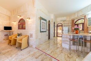 TV a/nebo společenská místnost v ubytování Paco's Resort Family Villa 10