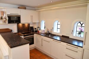 Køkken eller tekøkken på Residenz Wenningstedt