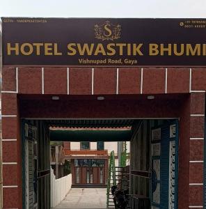 an entrance to a hotel waitzitz blump sign on a building at Hotel Swastik Bhumi in Gaya