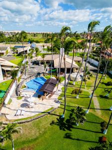 an aerial view of a resort with a swimming pool at Sunset Beach Villas in Taíba