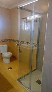 Ένα μπάνιο στο Apartamento Reya Beach