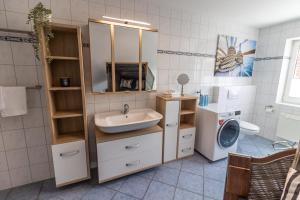Kuchyň nebo kuchyňský kout v ubytování Crevette + 19 fotografií