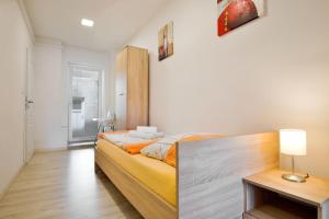 Posteľ alebo postele v izbe v ubytovaní Apartmány Děčín