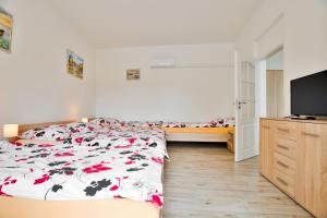 Posteľ alebo postele v izbe v ubytovaní Apartmány Děčín