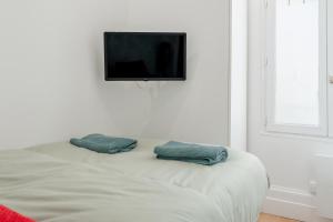 Posteľ alebo postele v izbe v ubytovaní Lavie Maison Eiffel AC Hot Tub