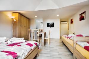 Posteľ alebo postele v izbe v ubytovaní Apartmány Děčín