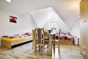 Posteľ alebo postele v izbe v ubytovaní Apartmány Děčín