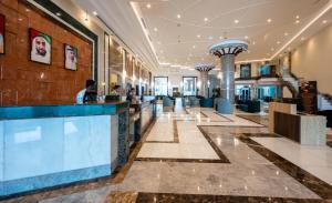 Vstupní hala nebo recepce v ubytování Sea Point Hotel Dubai Islands Formerly Park Regis by Prince + 44 fotografií