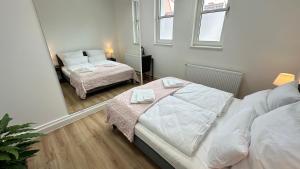 Katil atau katil-katil dalam bilik di Das Loft - Sauna - 4 Schlafzimmer - 2 Bäder - Stadtmitte - 2 Parkplätze