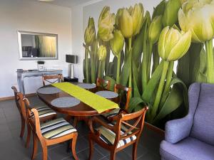 TV a/nebo společenská místnost v ubytování VILLA FELICIDADE