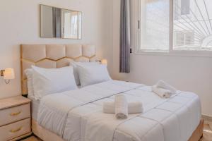 Postel nebo postele na pokoji v ubytování Dakhla Golden Sands