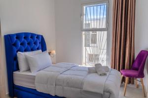 Postel nebo postele na pokoji v ubytování Dakhla Golden Sands + 9 fotografií