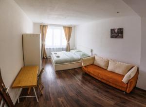 Posteľ alebo postele v izbe v ubytovaní Milde's apartment near the city center - Hospodarska street