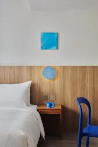 Postel nebo postele na pokoji v ubytování The Blue by Just Inn