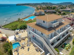 an aerial view of a building with the beach in the background at Corali Beach in Tsilivi