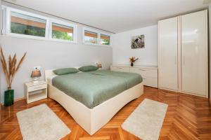 Posteľ alebo postele v izbe v ubytovaní Green Oasis