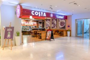 Certifikát, hodnocení, plakát nebo jiný dokument vystavený v ubytování Premier Inn Abu Dhabi Airport Business Park