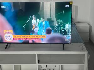 TV a/nebo společenská místnost v ubytování Studio + 2 fotografie