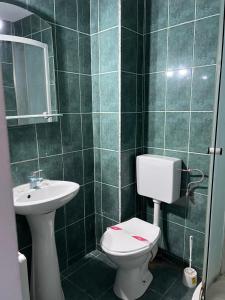 Koupelna v ubytování ALEXANDRA Hotel