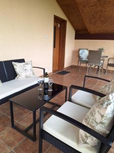 Televízia a/alebo spoločenská miestnosť v ubytovaní Apartments Kozjan