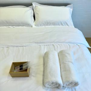 Letto o letti in una camera di Simple Dog Bungalow