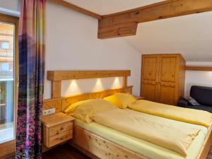 Posteľ alebo postele v izbe v ubytovaní Alpenpension Gastein