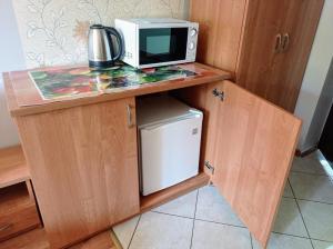 Dom Gościnny AgCez的厨房或小厨房