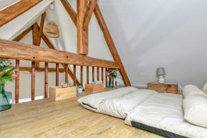 Ένα ή περισσότερα κρεβάτια σε δωμάτιο στο Martin - Appartement Le Croisic