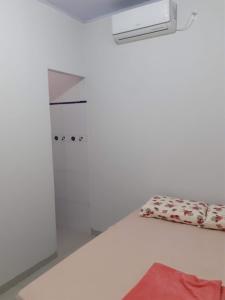 Cama ou camas em um quarto em Pousada São Jose City