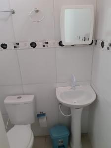 Um banheiro em Pousada São Jose City