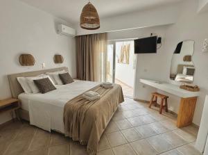 Ένα ή περισσότερα κρεβάτια σε δωμάτιο στο San Salvatore